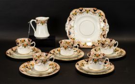 Royal Albert Bone China Tea Service comprising of twelve tea cups, twelve saucers,