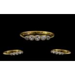 18ct Gold and Platinum 5 Stone Diamond Ring - Gallery setting marked 18ct and Platinum.