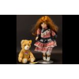 Steiff 'Cosy Friends' Teddy Bear and Musical Doll, the teddy designed by Steiff, with the button