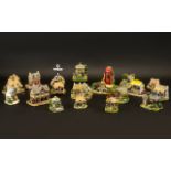 Collection of Lilliput Lane Cottages, comprising: The Old Grammar School, Tanner's Cottage,