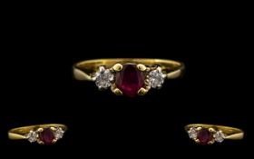 Ladies 18ct Gold 3 Stone Ruby & Diamond Ring. Pleasing design. Ring size J-K. Marked 750 - 18ct.