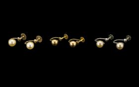 Two Pairs of Ladies 9ct Gold Pearl Set Earrings - both marked for 9ct.