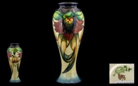 Moorcroft - Pleasing Tube lined Vase of Tapered Form 'Anna lily' Pattern.