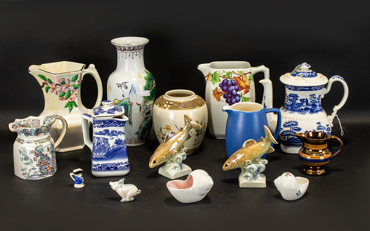 An Assorted Collection of Ceramics to include Rington's Mailing Ware leaf and berry jug,