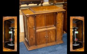 Vintage Singer Sewing Machine Housed in Oak Cabinet.
