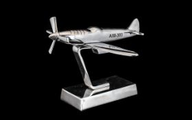 Chrome Desk Top Spitfire A58-303. Lovely chrome model aeroplane on rectangular block stand.