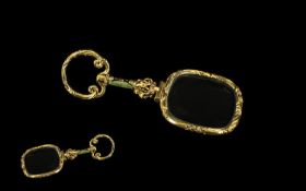 A Victorain Yellow Metal & Enamel Gentleman's Eye Glass. With scroll loop finial and enamelled