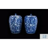 Pair Of Chinese Blue And White Lidded Jars. Typical decoration, character marks to under side,