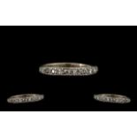 18ct White Gold Diamond Set Half Eternity Ring Marked 18ct (750) set with 14 round Diamonds of good