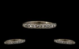 18ct White Gold Diamond Set Half Eternity Ring Marked 18ct (750) set with 14 round Diamonds of good