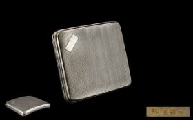 Gentleman's Silver Cigarette Case - from the 1920's with bright cut decoration and vacant cartouche.