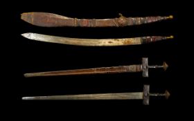 African Nigerian Sword (Takouba) 28 Inch Curved Blade, Leather Scabbard And Grip. c1880.