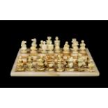 Marble Chess Set. Cream marble chess board with matching chess pieces. Please see images.