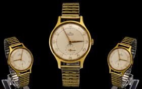 Smiths Delux - Large Gold Plated Mechanical Wind Gents Wrist Watch. Model A325. c.1955-1956.