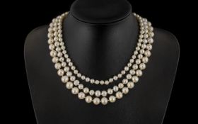 A Triple Strand Fresh Water Pearl Neckla