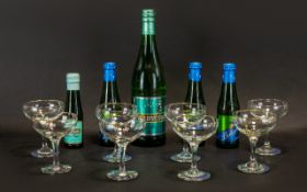 Collection of Babycham Glasses & Bottles. Eight original Babycham glasses with Bambi deer logo to