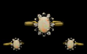 18ct Gold - Attractive Opal / Diamond / Sapphire Set Dress Ring. Marked 18ct Gold, The Central