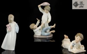 Nao by Lladro Trio of Young Children at bedtime. Various poses. 1. Pillow Fight - two boys no 281,