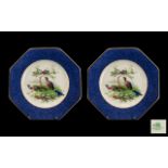 Two Vintage Wedgwood Plates decorated with peacocks, with blue and gilt trim. Please see images.