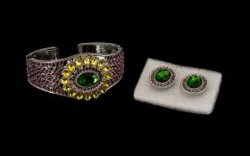 Green, Yellow and Purple Crystal Bangle with matching earrings, the bangle having a central boss
