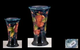 William Moorcroft Signed Tubelined Vase with Flared Rim, Pomegranate / Berries Pattern on Blue