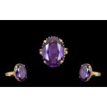 14ct Gold - Superb Quality Single Stone Amethyst Set Dress Ring. Marked 585, The Large Oval Shaped