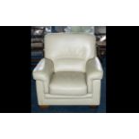 A Modern Contemporary Cream Leather Single Arm Chair.