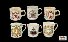 A Collection of Commemorative Beakers including four boxed Royal beakers, and two Manchester F.C.