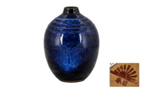 Japanese Mid 20th Century Attractive Blue Hares Fur Glaze Small Vase of excellent proportion.
