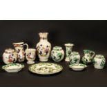 Mason's 'Chartreuse' Porcelain Collection comprising: three ginger jars, a small jug, a vase, a