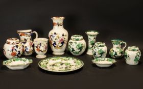 Mason's 'Chartreuse' Porcelain Collection comprising: three ginger jars, a small jug, a vase, a
