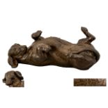 Doris Lindner Bronze-Effect Model Dachshund lying on its back, Length 10.5 inches.