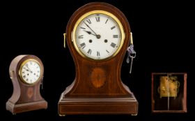 English 19th Century Impressive and Tall Mahogany and Inlaid Cased Mantel Clock of Waisted Form.