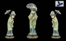 Lladro - Hand Painted Porcelain Figure ' Oriental Spring ' Model No 4988/ Issued 1978 - 1995. Height