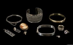 A Small Collection of Silver Jewellery to include two silver hinged bangles, a fully hallmarked