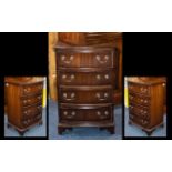 Late 20thC Mahogany Chest of Drawers of small proportions, slightly bow fronted four draweres.