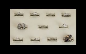 A Collection of Sterling Silver CZ Set Dress Rings. All Marked 925 Silver. Various Sizes and