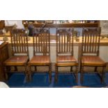 Set of Four Early 20th Century Golden Oak Dining Chairs - carved back rail and barley twist