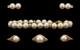 Contemporary Designed 9ct Gold Cultivated Pearl - consisting of 9ct gold and pearl bracelet with