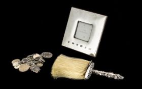 A Collection of Silver Items to include a Silver handled crumb brush, a modern silver photo frame