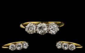 18ct Yellow Gold Three Stone Diamond Set Ring. The three diamonds of excellent colour and sparkle.