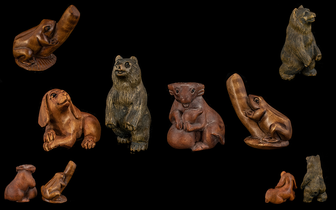 Four Japanese Boxwood Netsuke To Include A Bear, Dog, Frog And Water Buffalo Tallest 5cm. Three