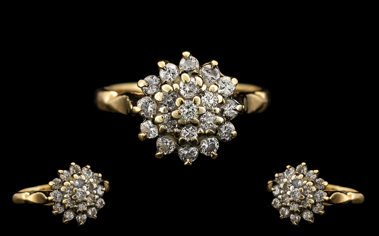 9ct Gold Diamond Set Cluster Ring. Flowerhead setting, fully hallmarked for 9.375. The diamond of