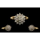 9ct Gold Diamond Set Cluster Ring. Flowerhead setting, fully hallmarked for 9.375. The diamond of