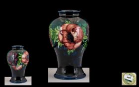 William Moorcroft Signed Bulbous Shaped Vase 'Anemone' Pattern. Circa 1940. Height 6.5'' - 16.25 cm.