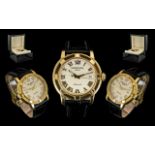Raymond Weil 18ct Gold Gents Automatic Date-Just Wrist Watch. With Attached Black Leather Strap, The