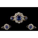 18ct Gold Attractive Sapphire & Diamond Cluster Ring Flower head design. Marked 18ct. The