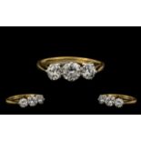 18ct Gold & Platinum Three Stone Diamond Ring of Pleasing Form marked 18ct and platinum. The
