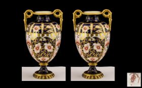 Royal Crown Derby Fine Pair of Twin Handled Imari Pattern Urn Shaped Vases embellished in gold to