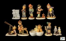 Collection of Hummel Figures seven (7) in total, including two figures playing musical